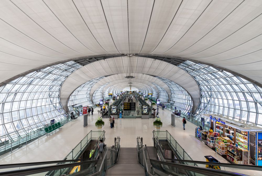 The curved glass concourse of Suvarnabhumi Airport