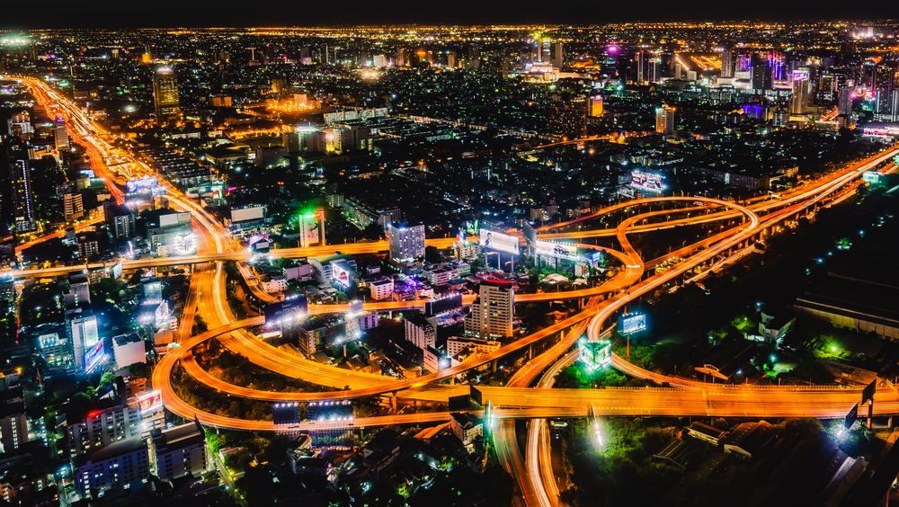 Bangkok's Makkasan expressway interchange glowing at night